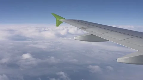 Airplane flying over clouds, view from the inside Stock-Footage 260422091