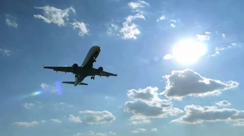 Airplane  flying over head slow motion Stock Footage 8571005
