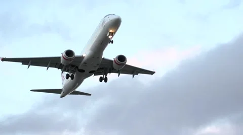 Airplane Flying Over Head Slow Motion Stock Footage 49549776