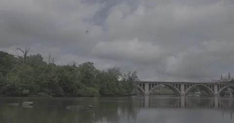 Airplane flying over the Key Bridge in Georgetown, Washington, D.C. Stock Footage 311904528