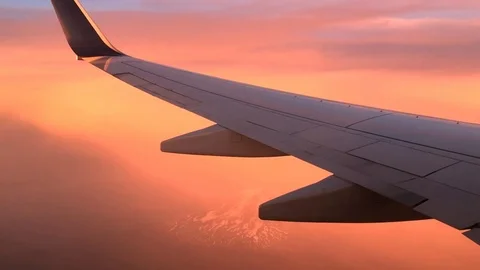 Airplane Flying Over Mountain During Beautiful Sunset (Pink Sky) Stock Footage 116460330