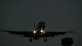 Airplane flying overhead at night HD Footage
