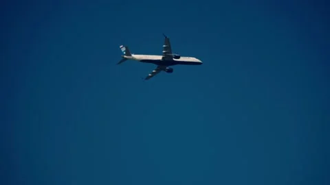 Airplane flying pass Stock Footage 172036103