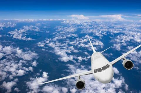 Airplane flying Stock Photos