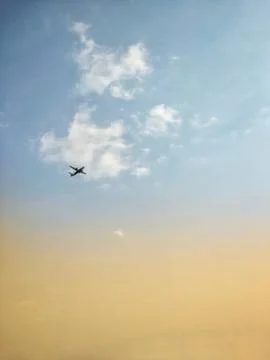 An Airplane flying. Stock Photos