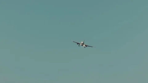 An Airplane flying in the Sky Video stock 69177262