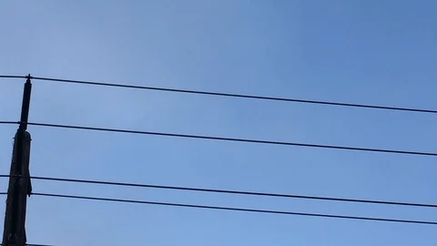 Airplane flying in the sky through clouds Stockbeeldmateriaal 102372736