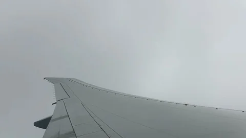 Airplane flying in Storm Clouds Sky Stock Footage 121260599