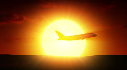 Airplane flying at sunrise Stock Footage 33294290