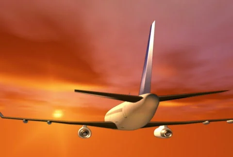 Airplane flying into sunset loopable Stock-Footage 110554