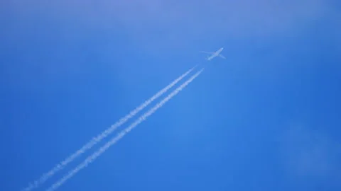 Airplane flying through the clouds Stock Footage 158086760