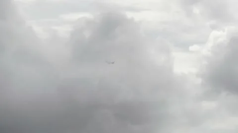 Airplane flying through clouds Stock Footage 201420841