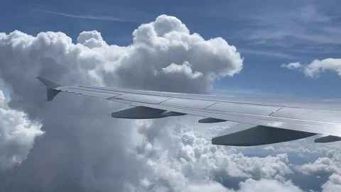 Airplane flying through the clouds Stock Footage 240503180