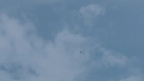 Airplane Flying Through Clouds Stock Footage 345872396