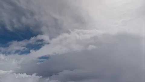 Airplane flying through a cloudy sky. Aerial footage above the clouds Stock Footage 88341246