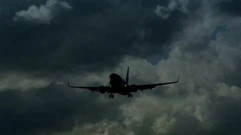 Airplane Flying Through Dramatic Storm Sky Clouds Stock Footage 88620909