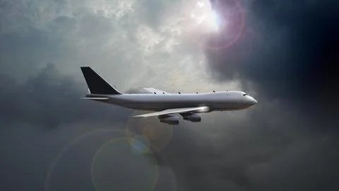 Airplane flying through moving clouds Ilustración de archivo