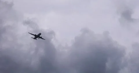 Airplane flying through storm clouds and turbulence; poor visibility; airspa Stock Footage 346732061