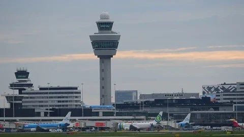 Airplane flying by the tower. Stock Footage 76573142