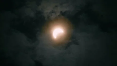 Airplane flying under Solar Eclipse 60fps Stock Footage 321310038