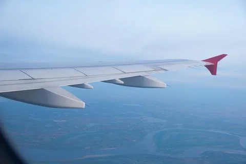 Airplane flying view from inside window aircraft of Traveling Stock Photos