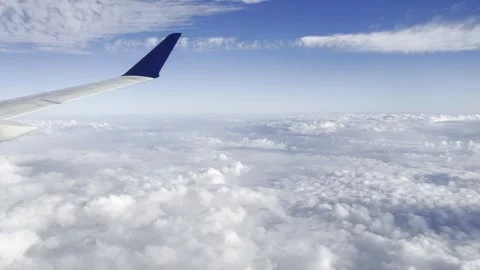 Airplane Flys Through Clouds POV Stock Footage 295969370