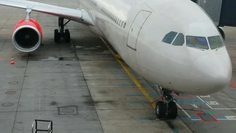 Airplane at the gate Stock Footage 70340971