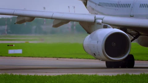 Airplane get ready to take off. Hot air from jet engine. SlowMotion. Stock Footage 93276592