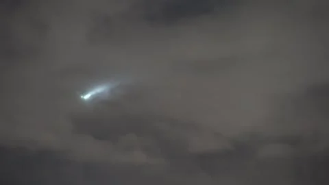 Airplane going through clouds in the dark night Stock Footage 265527360