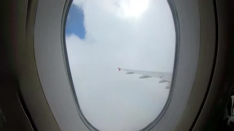 Airplane going through deep cloud, turbulence. Looking out the window of an.. Stock Footage 293777753