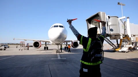 Airplane guided to gate Video stock 95293983