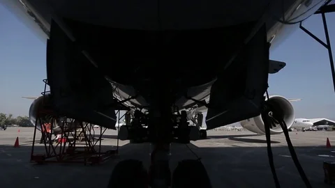 Airplane in hanger Vídeos de archivo 77129434