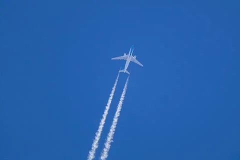 Airplane in High Flight Stock Photos