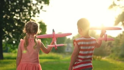 Airplane imagination of children, concept of active play in nature. Child, boy Stock Footage 252157638