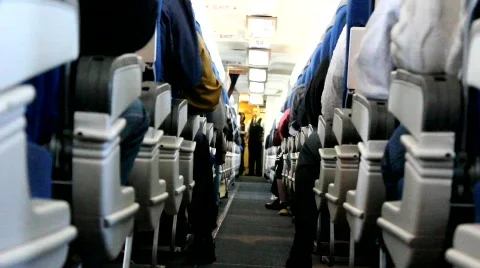 Airplane interior and aisle Stock Footage 754308