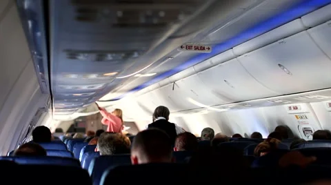 Airplane interior during flight Stockbeeldmateriaal 43913624