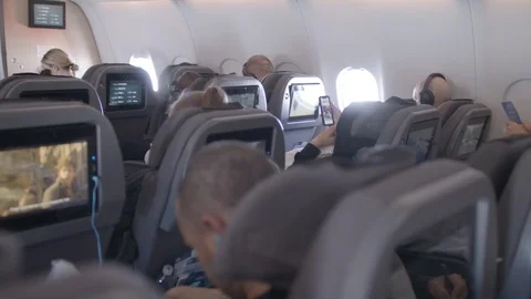 Airplane interior, long flight up in the air Stock Footage 116022973