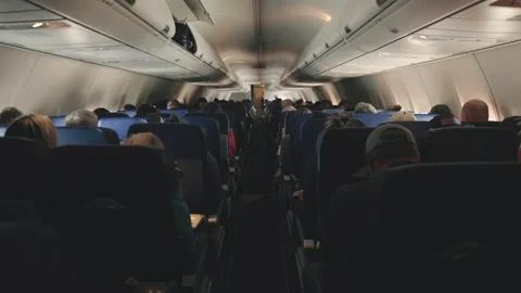 Airplane Interior Rf View Of Seats, Windows And Passenger In Queue Vídeos de archivo 347756607