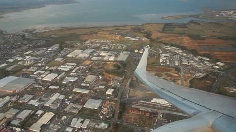 Airplane Interior View Through Jet Window New Zealand Auckland Suburb Stock Footage 101641676