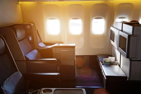 Airplane interiors, first class seats Stock Photos