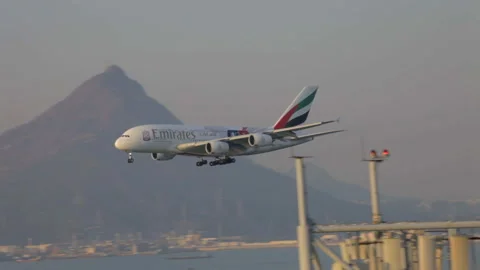 Airplane landing close at evening Stock Footage 248035555