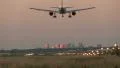 Airplane landing at dusk HD Footage