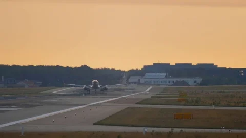 Airplane landing at the early morning Stock Footage