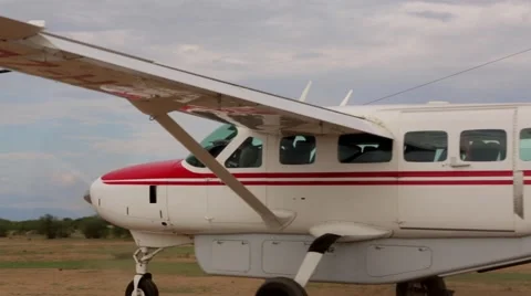 Airplane landing on field Stock Footage 49010048