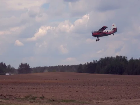 Airplane landing on the field Stock Footage 76647314