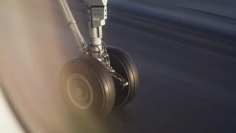 Airplane landing gear takeoff and retraction in Helsinki airport Finland Stock Footage