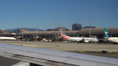 Airplane landing at the John Wayne Airport in Santa Ana, California Stock Footage 107944853