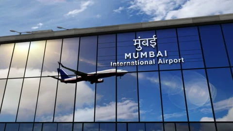 Airplane landing at Mumbai India, Maharashtra airport mirrored in terminal Stock Footage 145654204