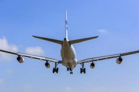 Airplane landing Stock Photos