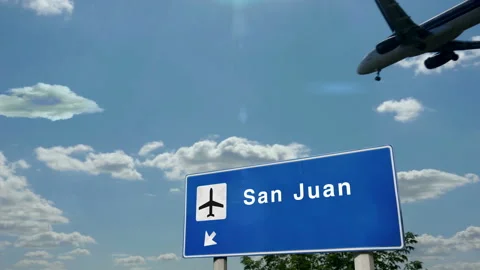 Airplane landing at San Juan Puerto Rico... | Stock Video | Pond5